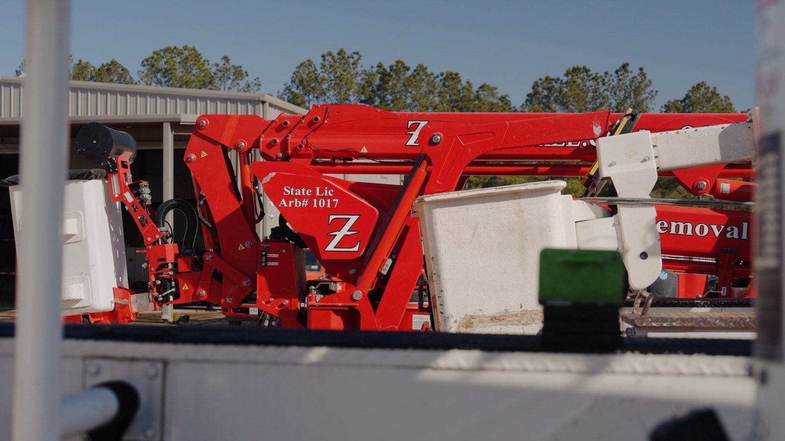 Close-up of a bucket truck’s state arborist license marking